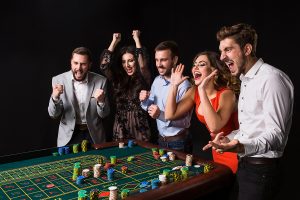 group of people playing in casino